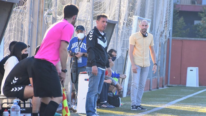 Els dos entrenadors durant el partit
